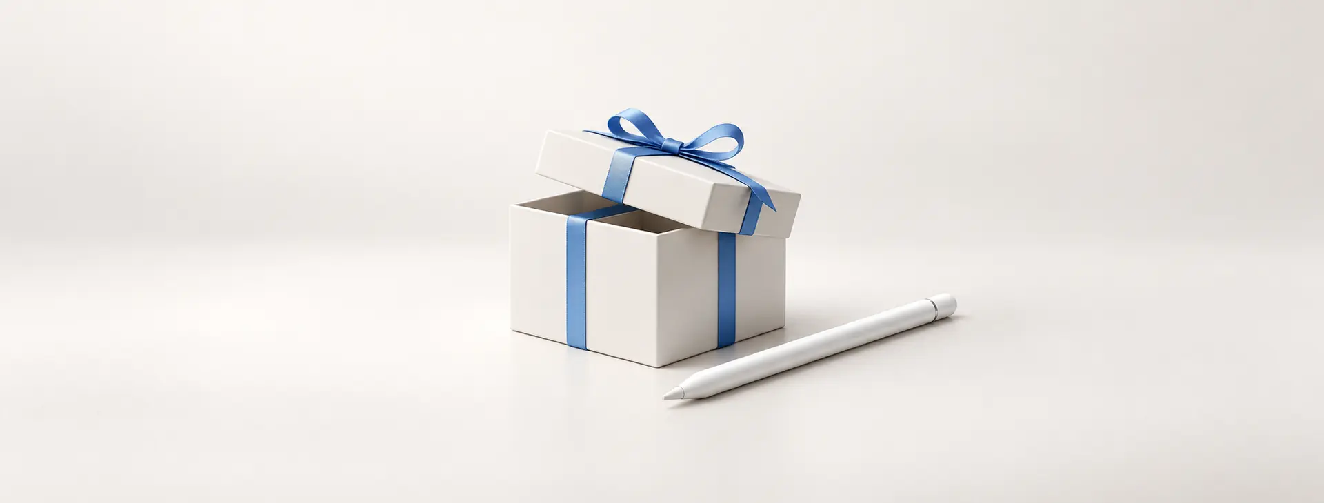 白色禮物盒與 Apple Pencil 風格觸控筆的 iPad 禮物選購概念圖